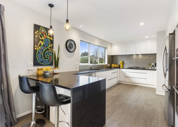  at 23 Helleur Road, Massey, Auckland