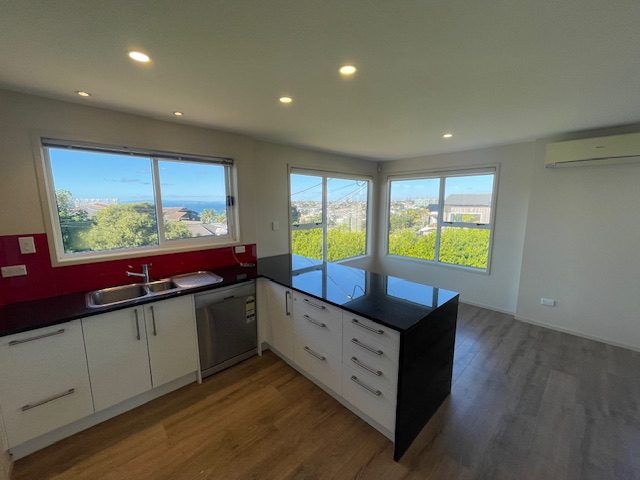  at 1/28 Beach Road, Castor Bay, North Shore City, Auckland