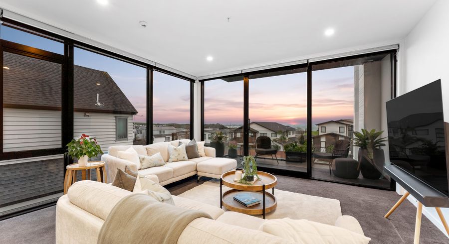  at 201/64 Te Oneroa Way, Long Bay, Auckland